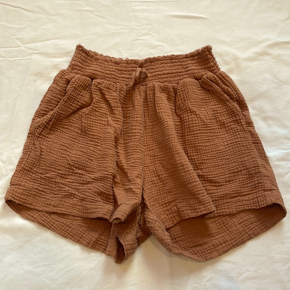 Just Living high waisted shorts, size small, pockets in the front, tie string